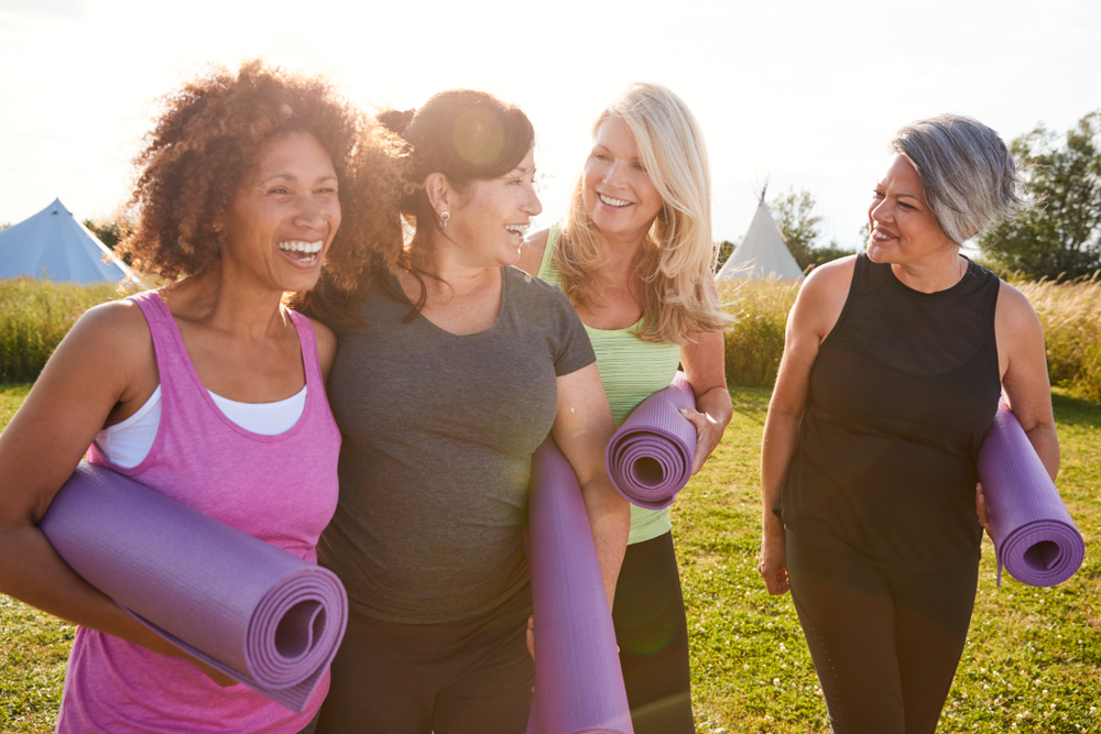 women smiling after yoga.