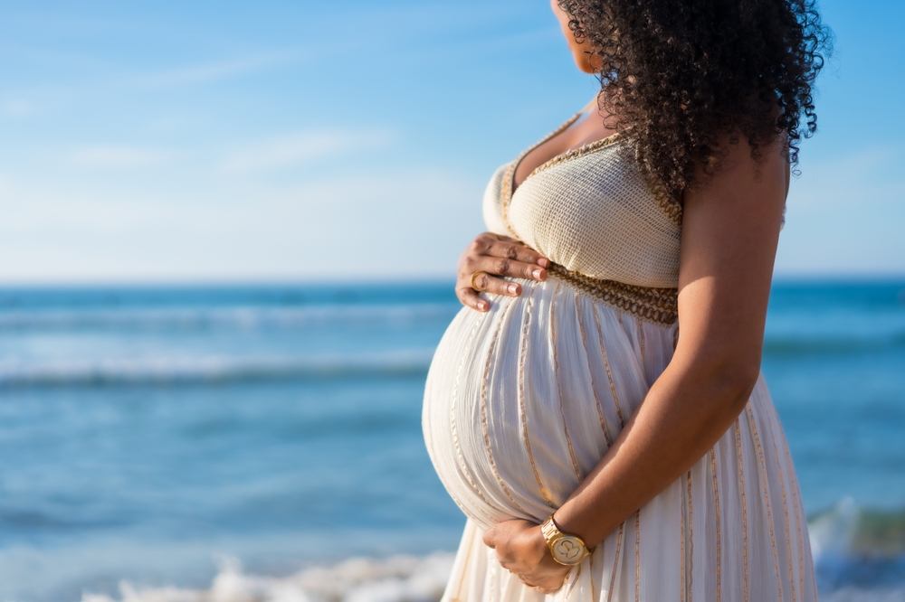 pregnant woman on beach